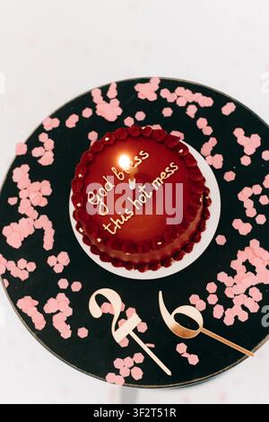 Birthday cake with pink confetti Stock Photo