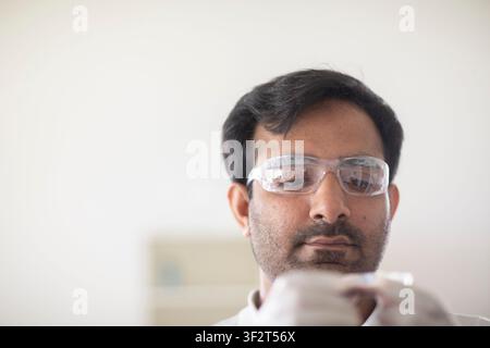 scientist male working in a laboratory Stock Photo
