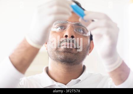 scientist male working in a laboratory Stock Photo
