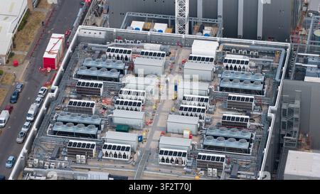 Aerial view of a large data center campus in Slough, showing HVAC systems, emergency backup power generators, cloud computing and massive digital infr Stock Photo