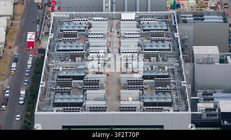 Aerial view of a large data center campus in Slough, showing HVAC systems, emergency backup power generators, cloud computing and massive digital infr Stock Photo