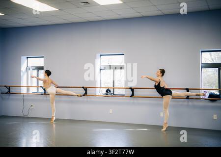 Ballerinas training at dance studio barre Stock Photo