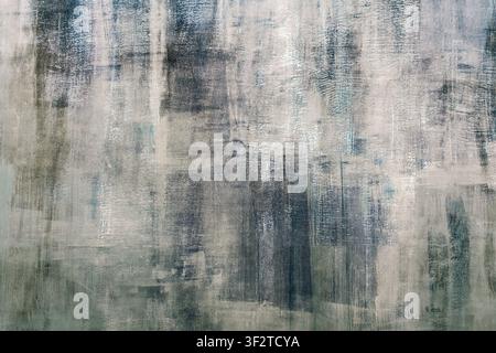 Abstract textured wall background with muted blue-gray brush strokes and weathered paint surface Stock Photo
