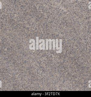 A close-up of a blue and grey speckled granite stone texture, suitable for architectural surfaces. Stock Photo