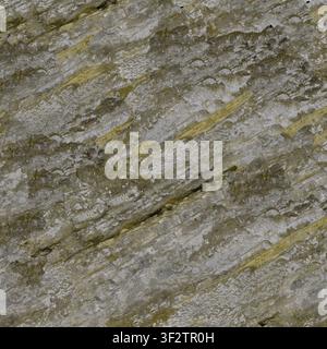 A close-up texture showing diagonal rock strata with variations in color from grey to yellow-green mineral deposits. Stock Photo