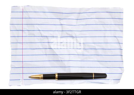 Blank torn and wrinkled lined paper with a pen isolated on white for education or brainstorming Stock Photo