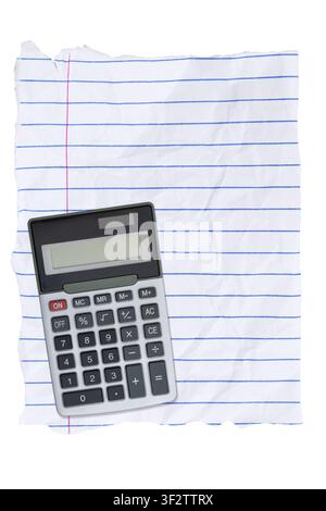 Blank torn and wrinkled lined paper with a calculator isolated on white for education or math Stock Photo