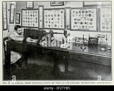 Scientist operating an early Le Chatelier inverted microscope apparatus, examining metal samples and microstructures in a laboratory setting with metallurgical charts on the wall. From the Article MICROSCOPIC METALLOGRAPHY AND ITS EMPLOYMENT IN FRENCH INDUSTRIES. By Jacques Boyer. From The Engineering Magazine Devoted to Industrial Progress Volume XXXVI October 1908 - March 1909 The Engineering Magazine Co. Stock Photo