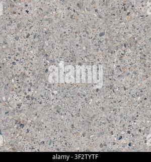 Close-up of exposed aggregate concrete pavement with visible gravel and pebbles. Stock Photo