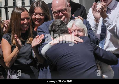 London, UK. 20th July, 2026. Burnham hugs his mum Eileen Burnham. Andy Burnham, new Prime Minister of the United Kingdom, arrives and makes his first speech outside 10 Downing Street, and chats to friends, family and supporters with his wife Mary-Frane van Heel. Andy Burnham officially replaces Sir Keir Starmer and becomes the UK's 59th prime minister today. Credit: Imageplotter/Alamy Live News Stock Photo