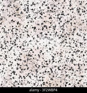 A close-up of a light beige terrazzo surface containing small dark blackish stone fragments. Stock Photo