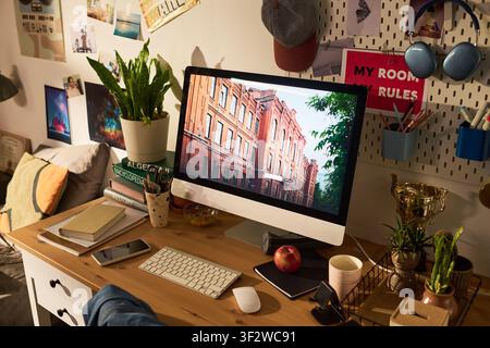 Student Bedroom Workspace Showing Online College Research Setup Stock Photo