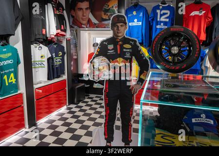 Formula 1 Shop with Max Verstappen Cardboard Cutout and Ayrton Senna Apparel. Merch clothes sale. Verona, Italy - June 25, 2026 Stock Photo