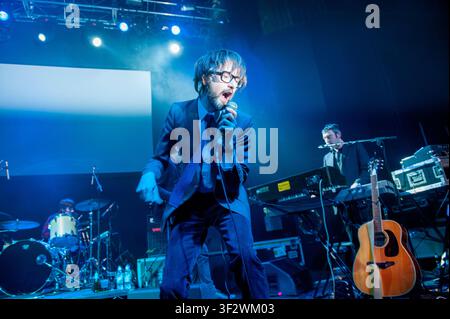 Jarvis Cocker, lead singer of the English alternative rock band Pulp, performing live on stage Stock Photo