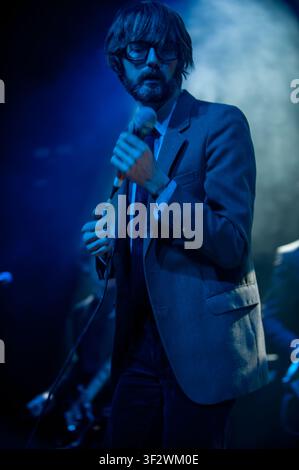 Jarvis Cocker, lead singer of the English alternative rock band Pulp, performing live on stage Stock Photo
