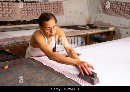 Textiles block printing onto fabric, Jaipur, Rajasthan , India, Stock Photo