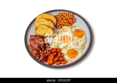 Full English Breakfast with Fried Eggs, Bacon, Sausages, Baked Beans and Toast Stock Photo