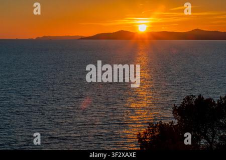 Sunset over the coastline of Rayol-Canadel-sur-Mer in December, Var, France Stock Photo