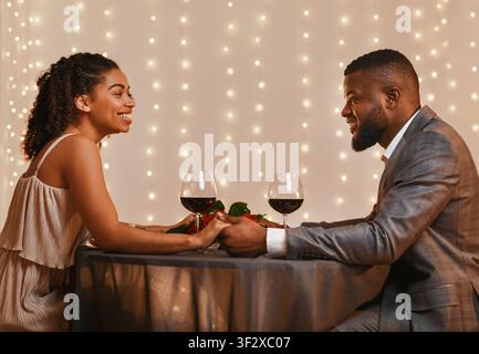 Romantic couple in love having date at restaurant Stock Photo