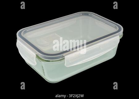 Glass rectangular food storage container with a clear plastic airtight lid and side clasps, ideal for meal prep, leftovers, pantry organization and ec Stock Photo