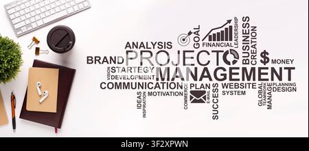 Project management texting on office table tools and coffee Stock Photo