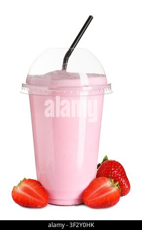 Delicious strawberry milkshake in plastic cup and fresh berries isolated on white Stock Photo
