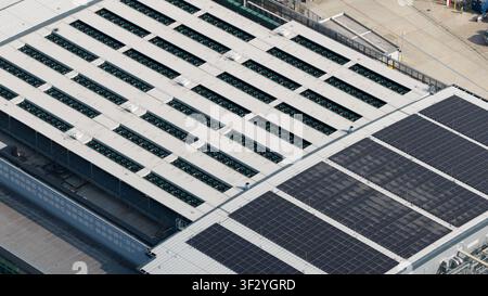 Aerial view of rooftop cooling systems on large data centers in Slough, showing cloud infrastructure, power demand and digital technology near London. Stock Photo