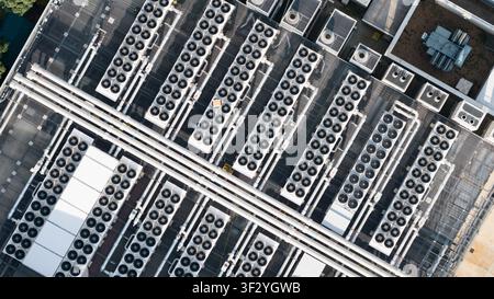 Aerial view of rooftop cooling systems on large data centers in Slough, showing cloud infrastructure, power demand and digital technology near London. Stock Photo