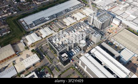 Aerial view of rooftop cooling systems on large data centers in Slough, showing cloud infrastructure, power demand and digital technology near London. Stock Photo