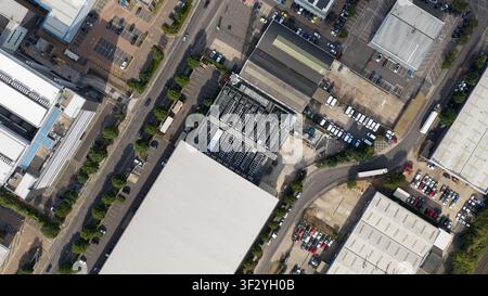 Aerial view of rooftop cooling systems on large data centers in Slough, showing cloud infrastructure, power demand and digital technology near London. Stock Photo