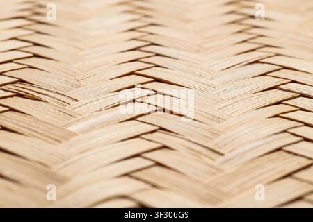 Close up of natural woven bamboo texture with a diagonal pattern, organic material background for design and decor, this close up detail showcases the Stock Photo