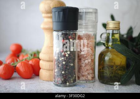 Spices and ingredients on a kitchen table Stock Photo