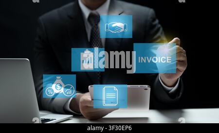 A professional businessman interacts with a digital interface on a tablet, managing invoices, financial reports, and business partnerships through hol Stock Photo