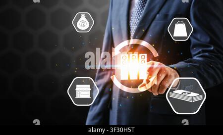 Professional businessman interacting with virtual icons representing money, shopping, retail, and data servers. Ideal for fintech, e-commerce, and bus Stock Photo