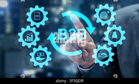 Professional businessman touching virtual B2B interface with marketing, sales and strategy icons. Conceptual image for business to business networking Stock Photo