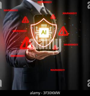 Businessman holding a phone featuring an AI shield icon surrounded by red warning symbols. Illustrates cybersecurity risks, data protection, and ethic Stock Photo