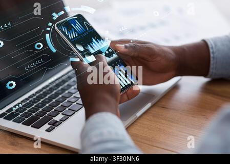Businessman using smart phone with holograms datas Stock Photo