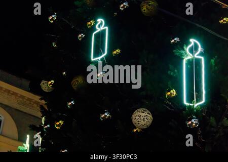 Detail of decorated Christmas tree with xmas lights Stock Photo