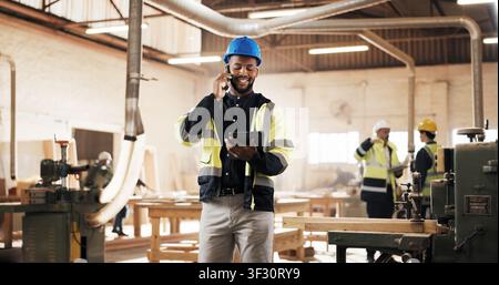 Phone call, man and construction worker on site with communication, feedback or update on repairs. Cellphone, talking and civil engineer on mobile Stock Photo
