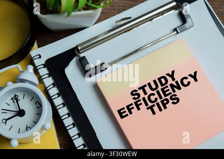 Concept of study efficiency tips write on sticky notes isolated on Wooden Table. Stock Photo