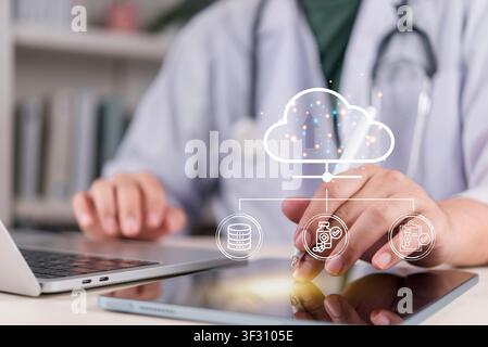 Doctor using digital tablet with medical cloud computing technology icons. Electronic health record EMR, healthcare digital database system, and onlin Stock Photo