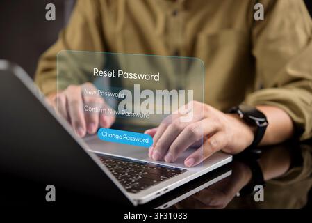 Man hands typing on laptop with virtual password reset interface. Concept of changing new password, account recovery, security update, and digital ide Stock Photo