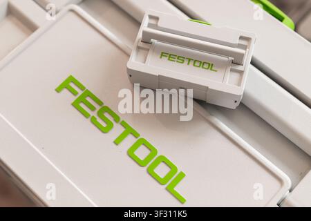 PRAGUE, CZECH REPUBLIC - JUNE 2026. Arranging precision storage box featuring Festool branding in a clean workshop setting. The bright color scheme and organized layout enhance productivity during woodworking tasks.  Stock Photo