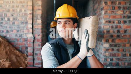 Architect, man and wood plank with helmet on construction site for building progress or development. Male person, civil engineer or contractor Stock Photo