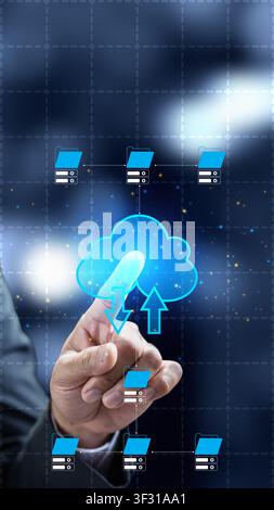 Conceptual image of cloud computing showing a businessman's hand selecting a digital cloud icon with data transfer arrows within a complex network inf Stock Photo