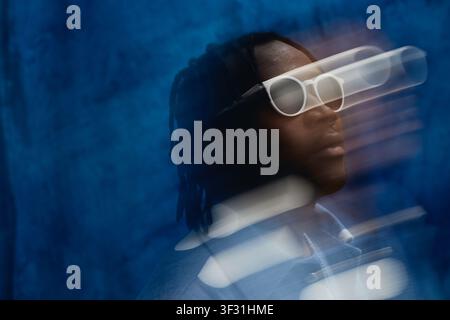 Black Man Wearing Futuristic Glasses for Digital Innovation Concept Stock Photo