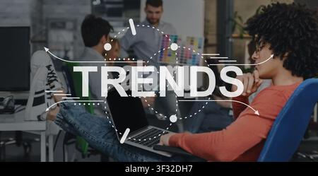 The word Trends written on blurred office background Stock Photo