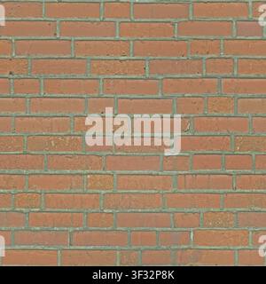 An industrial-style red brick wall featuring clean, uniform joints. Stock Photo