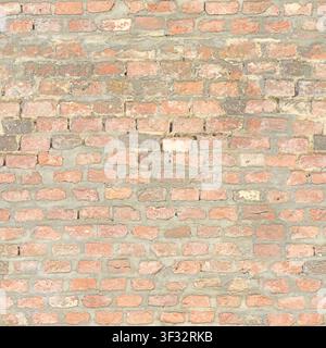 A rough, weathered red brick wall with thick mortar joints, showing signs of aging. Stock Photo