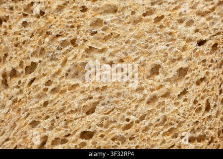 Macro texture of whole wheat bread crumb, detailed food background. Stock Photo